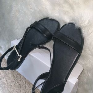Black leather sandals
